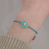 Turquoise Hamsa Tassel Thread Bracelet