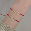 Sideways Wishbone Red Thread Bracelet